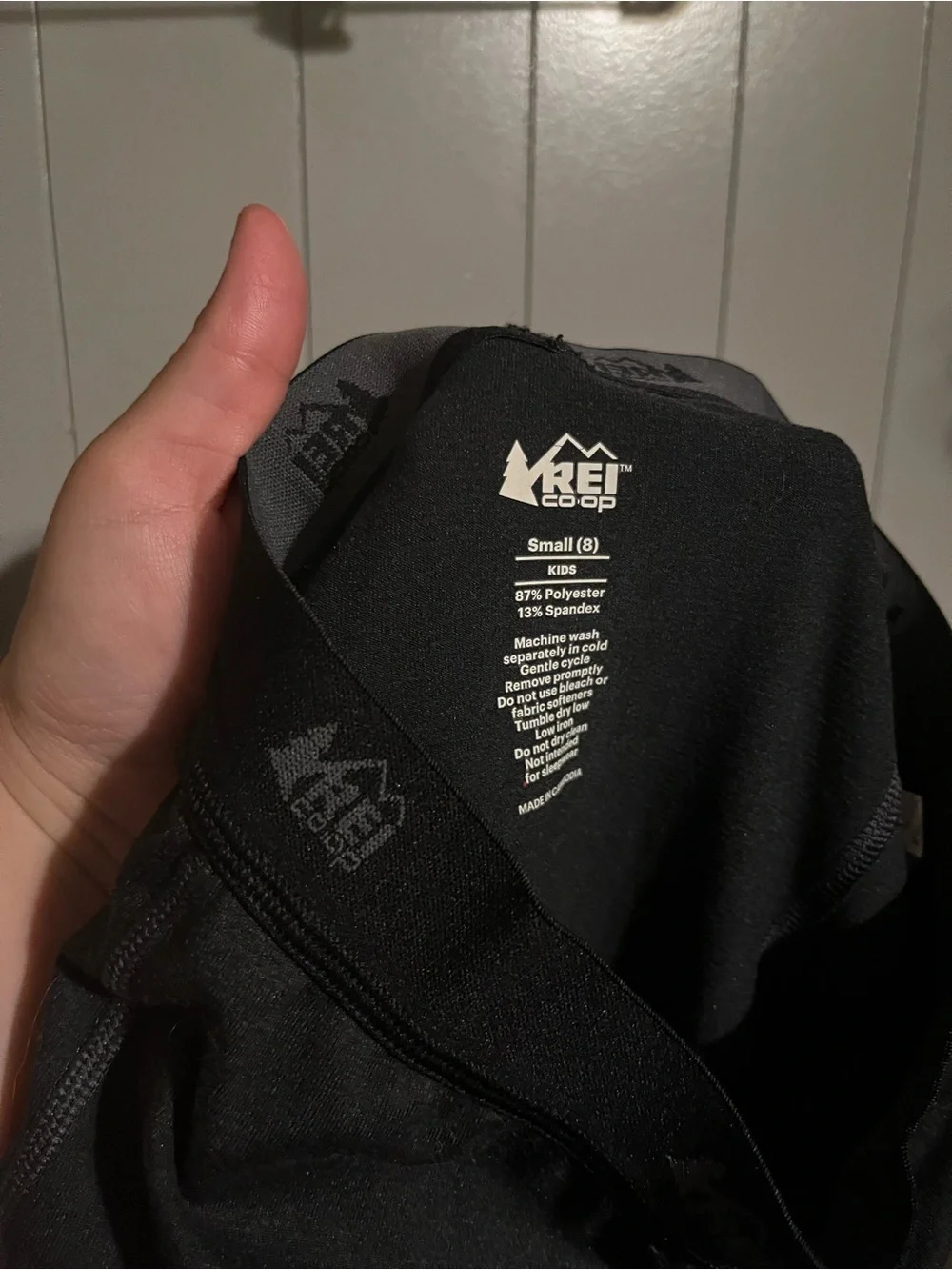 REI Kids black legging base layer